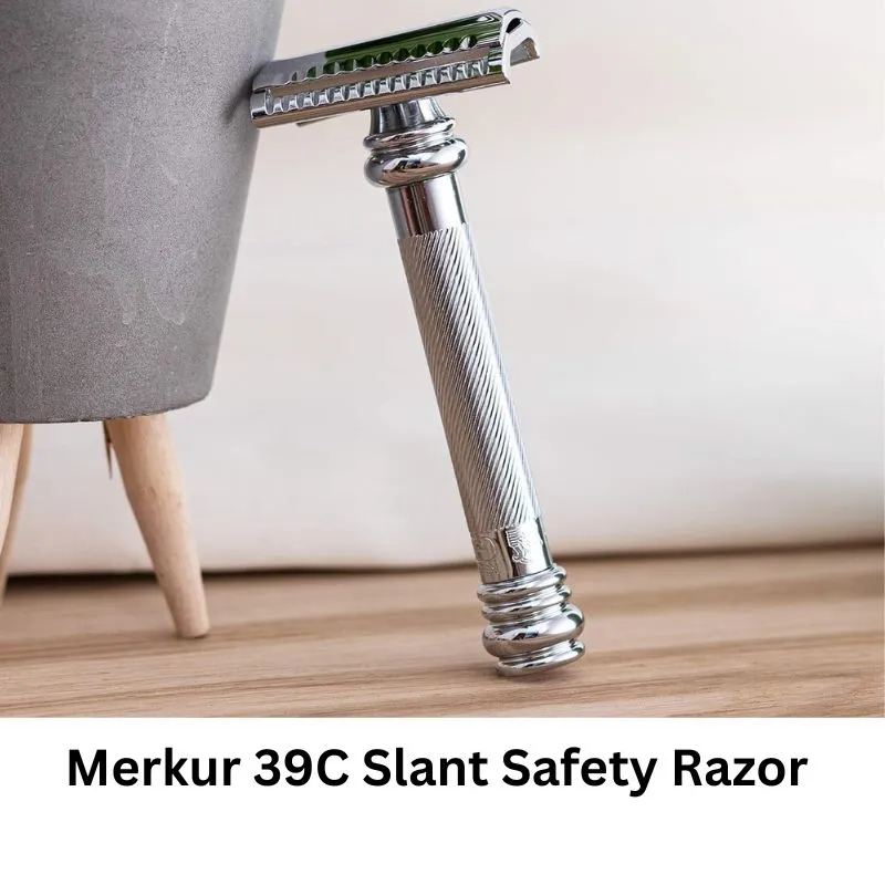 the merkur 39C slant razor laying against a tub