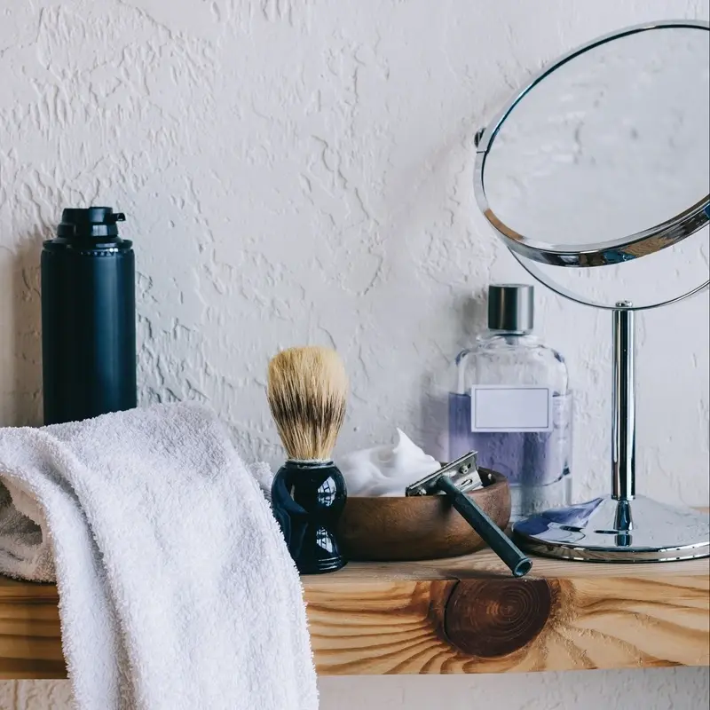 shaving kit including razor brush towel grooming oil and mirror